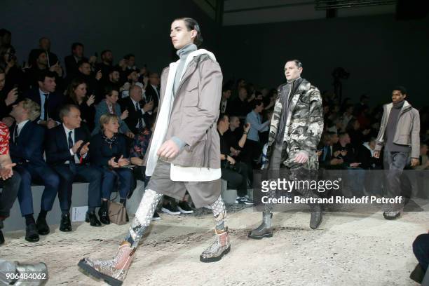 Xavier Dolan, CEO of Louis Vuitton Michael Burke and his wife Brigitte Burke attend the Louis Vuitton Menswear Fall/Winter 2018-2019 show as part of...