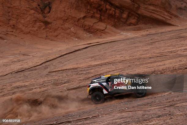 Stephane Peterhansel of France and Peugeot Total drives with co-driver Jean Paul Cottret of France in the 3008 DKR Peugeot car in the Classe : T1.4 2...