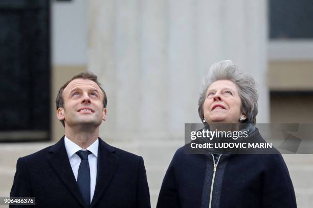 Britain's Prime Minister Theresa May and French President Emmanuel Macron attend a ceremony at the Royal Military Academy Sandhurst, west of London...