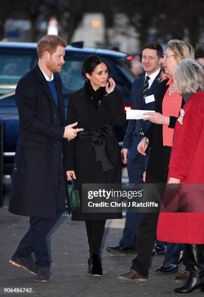 Prince Harry and fiancee Meghan Markle arrive for their visit to Star Hub on January 18, 2018 in Cardiff, Wales.