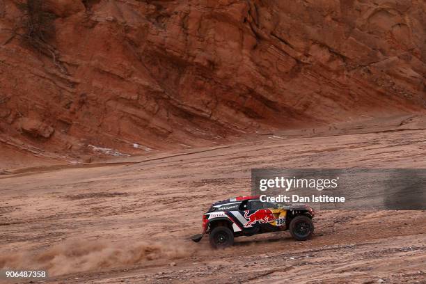 Cyril Despres of France and Peugeot Total drives with co-driver David Castera of France in the 3008 DKR Peugeot car in the Classe : T1.4 2 Roues...