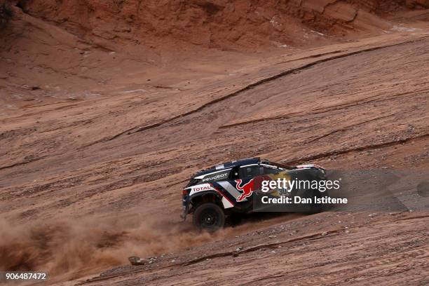 Carlos Sainz of Spain and Peugeot Total drives with co-driver Lucas Cruz of Spain in the 3008 DKR Peugeot car in the Classe : T1.4 2 Roues Motrices,...