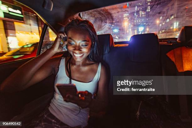 taxi ride in new york city - nyc nightlife stock pictures, royalty-free photos & images