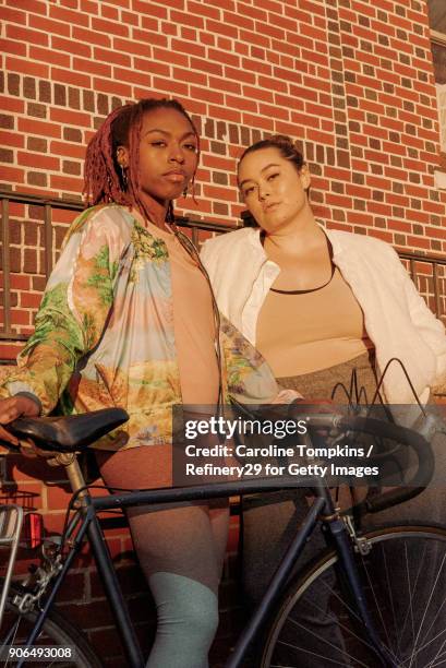 Two Young Women with Bicycle