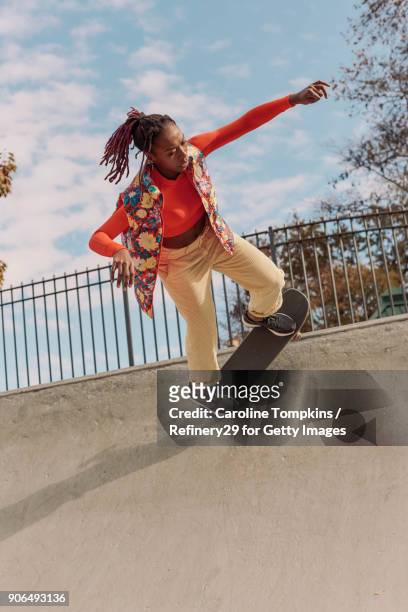 Young Woman Skateboarding