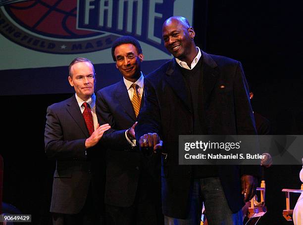 Inductee Michael Jordan receives a ring commemorating his entrance to the Basketball Hall of Fame Class of 2009 from Hall of Fame Chairman of the...