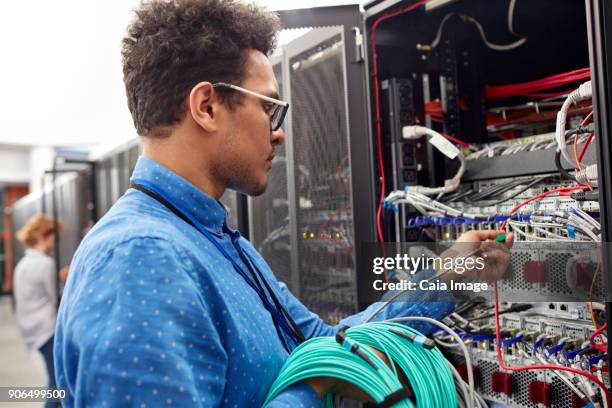 Plugging In Computer Plugging In Computer Photos and Premium High Res Pictures - Getty Images