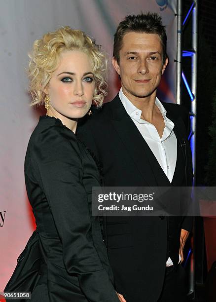 Actress Charlotte Sullivan and director Peter Stebbings attend the "Defendor" premiere after party during the Toronto International Film Festival on...