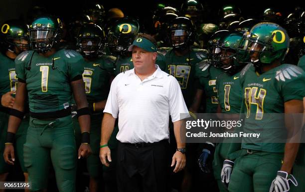 Head Coach Chip Kelly of the Oregon Ducks waits to enter the field before the game against the Purdue Boilermakers at Autzen Stadium on September 12,...