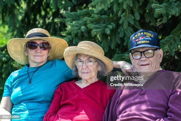 wwii and korean conflict us army military veteran relaxing with family - mad husband stock pictures, royalty-free photos & images