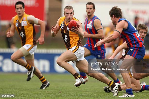 Sam Iles of the Hawks runs with the ball during the VFL Semi Final match between Port Melbourne and the Box Hill Hawks at Teac Oval on September 13,...