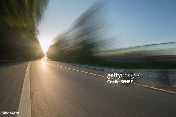 road background - motion blur road stock pictures, royalty-free photos & images