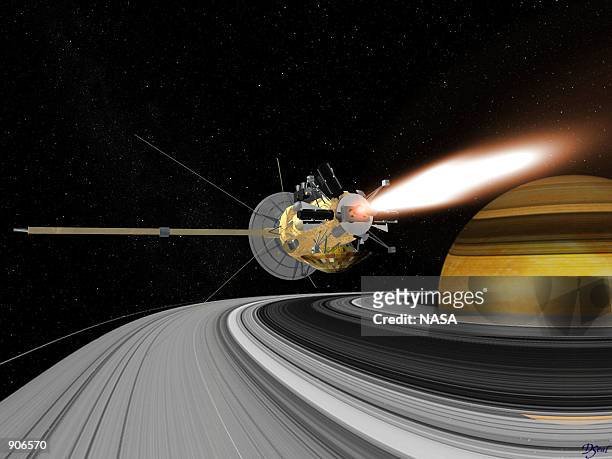 An artist rendering of the Cassini spacecraft entering orbit around Saturn. The two-story, $3.4 billion spacecraft carrying a load of deadly...
