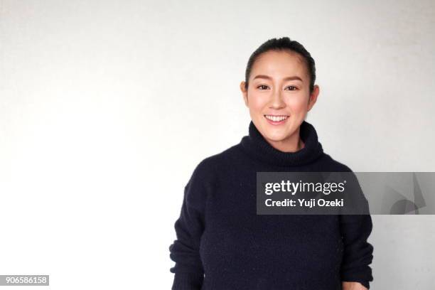 young woman smiling - hair back ストックフォトと画像