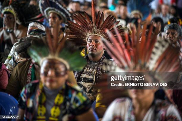 Members of indigenous communities from Peru, Brasil and Bolivia gather during the assembly of the Amazonian church in Puerto Maldonado, before the...
