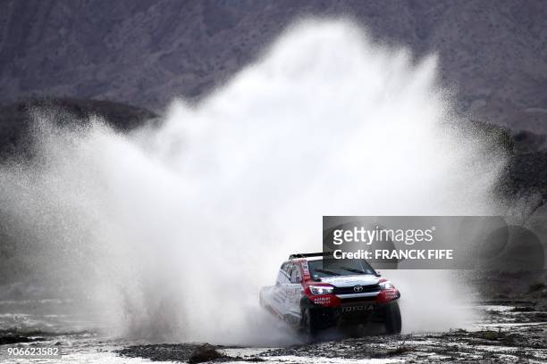 Toyota's driver Giniel De Villiers of South Africa and his co-driver Dirk Von Zitzewitz of Germany, compete during the Stage 12 of the 2018 Dakar...