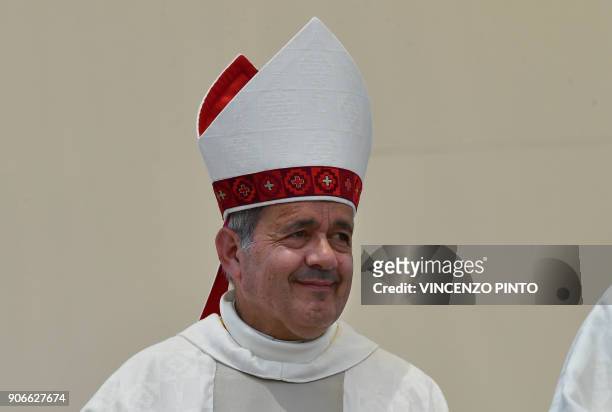 The bishop of Osorno, Juan Barros, takes part in an open-air mass celebrated by Pope Francis at Lobitos Beach, near the Chilean northern city of...