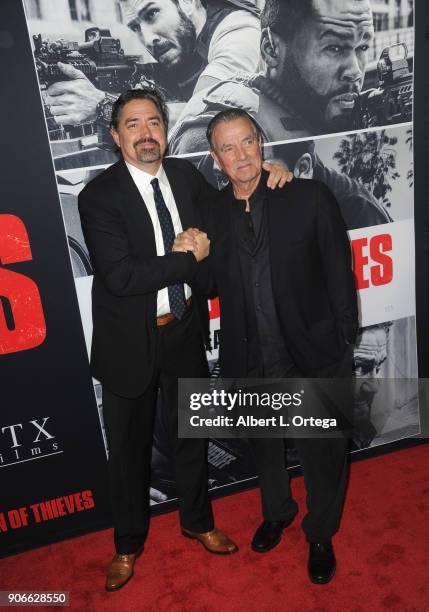 Director Christian Gudegast and actor/father Eric Braeden arrive for the Premiere Of STX Films' "Den Of Thieves" held at Regal LA Live Stadium 14 on...