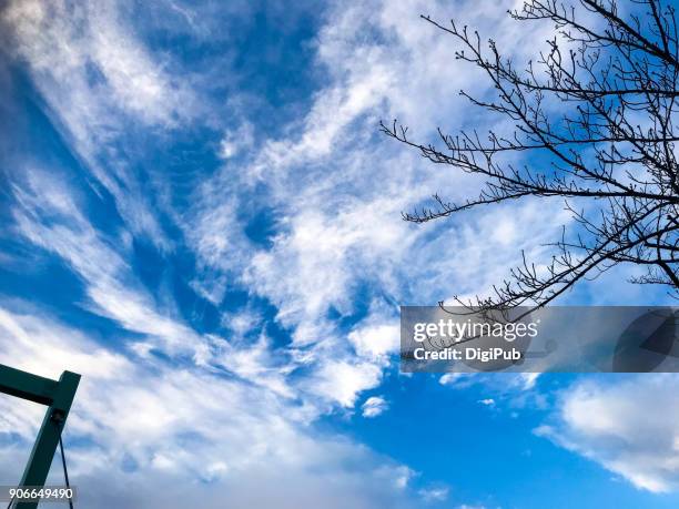 blue sky with white clouds in the morning - january blues stock pictures, royalty-free photos & images