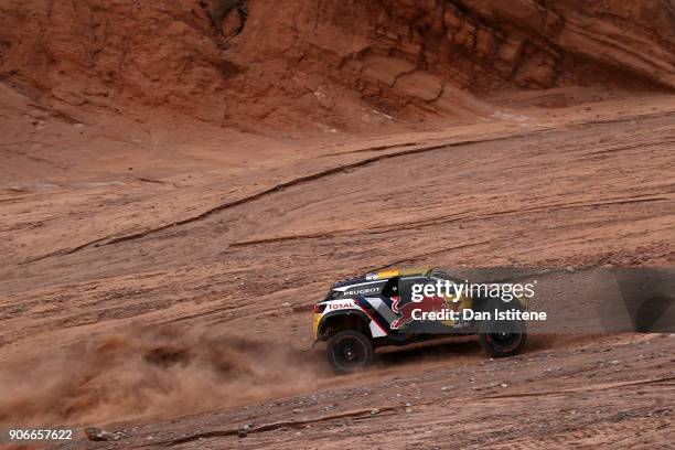 Stephane Peterhansel of France and Peugeot Total drives with co-driver Jean Paul Cottret of France in the 3008 DKR Peugeot car in the Classe : T1.4 2...