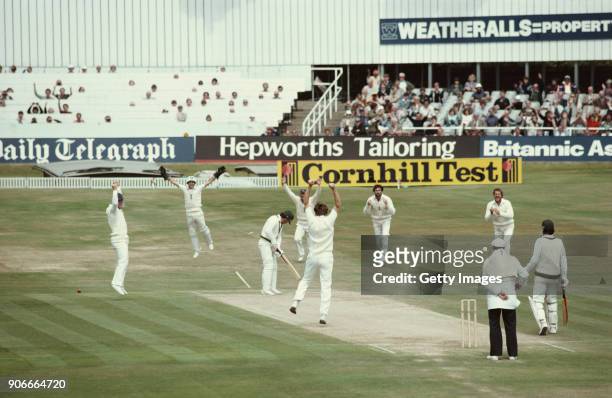 Australian batsman Allan Border is bowled by Chris Old for 0 as from left to right Mike Gatting, wicketkeeper Bob Taylor, Mike Brealey Graham Gooch...
