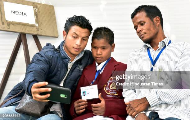 Family members take selfie with Bapu Gaidhani award winner Betshwajohn Peinlang from Meghalaya at National Bravery Awards 2017 winners press preview...