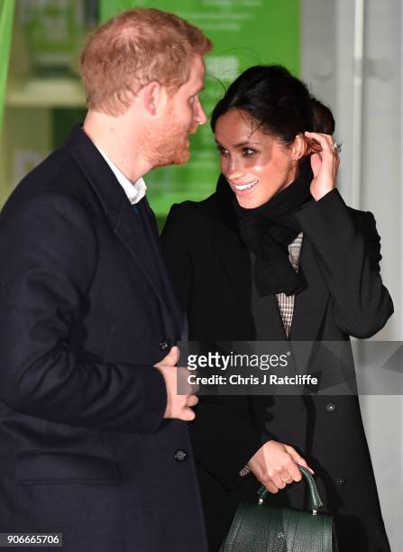 Prince Harry and fiancee Meghan Markle leave after their visit to Star Hub on January 18, 2018 in Cardiff, Wales.
