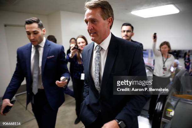Sen. Jeff Flake speaks to reporters at the U.S. Capitol January 18, 2018 in Washington, DC. Congress is working to avoid a government shutdown ahead...