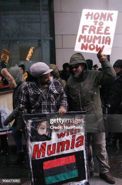 Protesters rally for the release of Mumia Abu-Jamal in front of the Philadelphia Criminal Justice Center in Center City Philadelphia on January 17,...