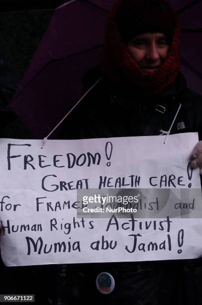 Protesters rally for the release of Mumia Abu-Jamal in front of the Philadelphia Criminal Justice Center in Center City Philadelphia on January 17,...