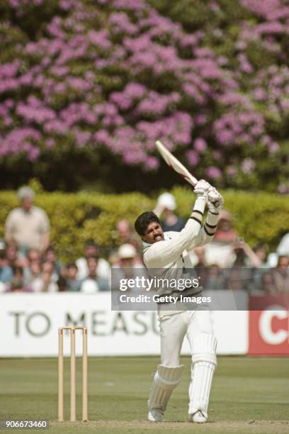 India batsman Kapil Dev hits out during his 175 not out during the 1983 World Cup group match against Zimbabwe at Nevill Ground, on June 18, 1983 in...