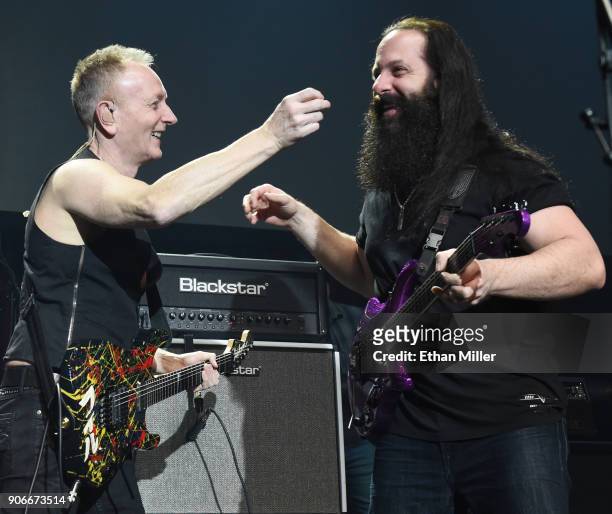 Guitarists Phil Collen and John Petrucci perform as part of the G3 concert tour at Brooklyn Bowl Las Vegas at The Linq Promenade on January 17, 2018...