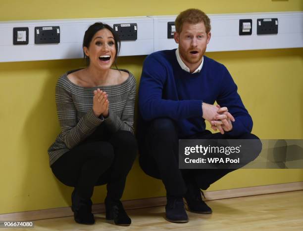 Prince Harry and his fiancee Meghan Markle attend a street dance class during their visit to Star Hub on January 18, 2018 in Cardiff, Wales.