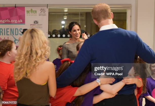 Prince Harry and his fiancee Meghan Markle attend a street dance class during their visit to Star Hub on January 18, 2018 in Cardiff, Wales.