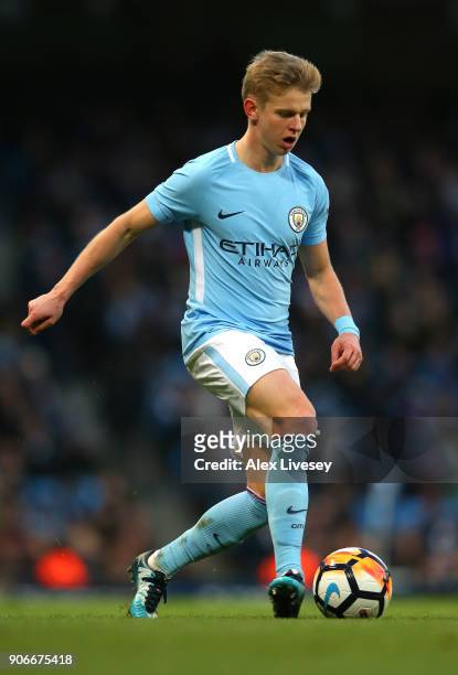 Oleksandr Zinchenko of Manchester City runs with the ball during The Emirates FA Cup Third Round match between Manchester City and Burnley at Etihad...