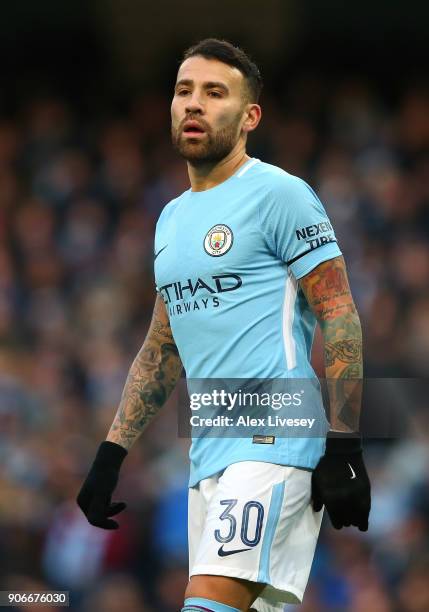 Nicolas Otamendi of Manchester City looks on during The Emirates FA Cup Third Round match between Manchester City and Burnley at Etihad Stadium on...