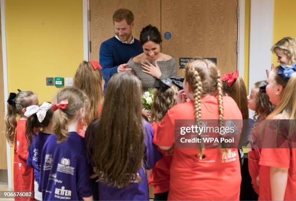 Prince Harry and his fiancee Meghan Markle attend a street dance class during their visit to Star Hub on January 18, 2018 in Cardiff, Wales.