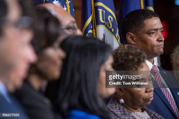Rep. Cedric Richmond, D-La., right, Congressional Black Caucus chairman, attends a news conference in the Capitol Visitor Center to discuss a...