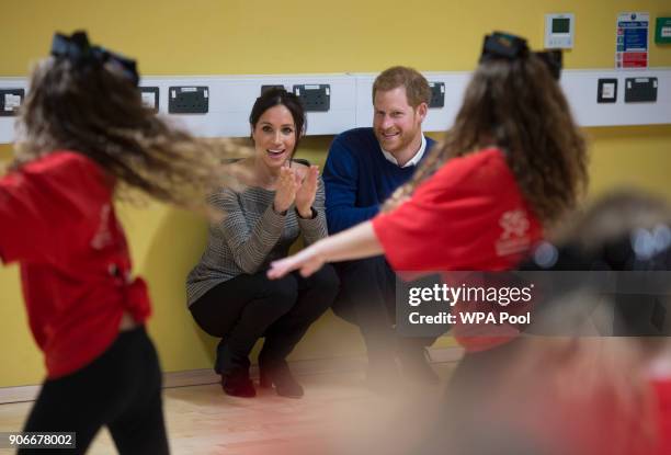 Prince Harry and his fiancee Meghan Markle attend a street dance class during their visit to Star Hub on January 18, 2018 in Cardiff, Wales.