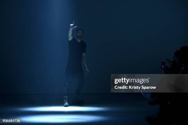 Designer Boris Bidjan Saberi acknowledges the audience during the Boris Bidjan Saberi Menswear Fall/Winter 2018-2019 show as part of Paris Fashion...