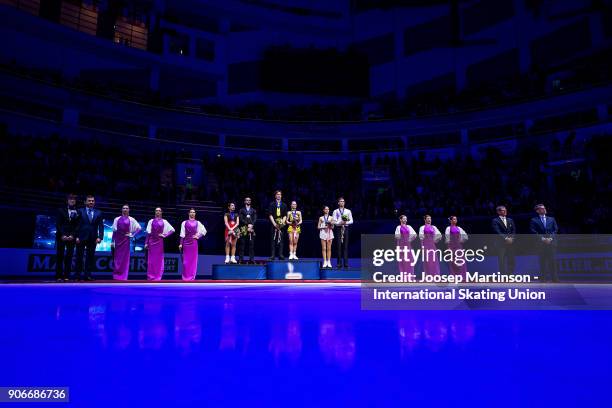 Ksenia Stolbova and Fedor Klimov, Evgenia Tarasova and Vladimir Morozov, Natalia Zabiiako and Alexander Enbert of Russia pose in the Pairs medal...