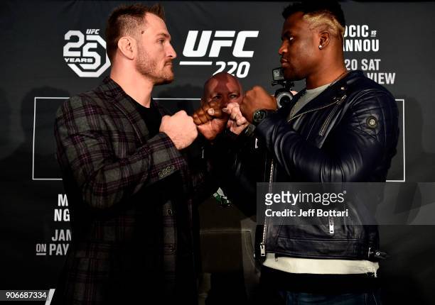 Heavyweight champion Stipe Miocic and Francis Ngannou of Cameroon face off during the UFC 220 Ultimate Media Day at Fenway Park on January 18, 2018...