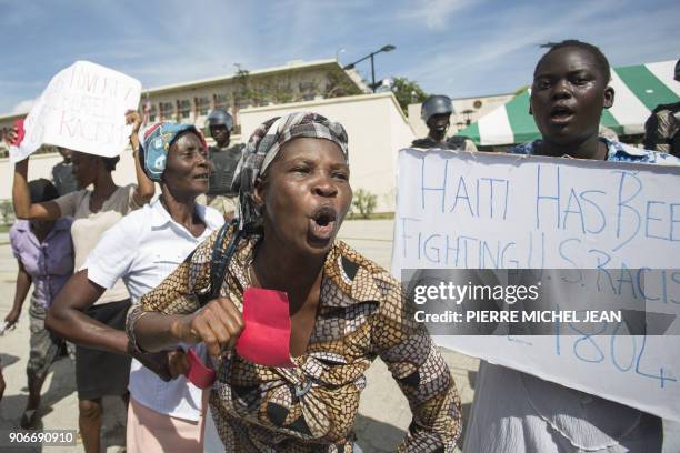 Haitians gather in front of the US Embassy in Port-au-Prince during a sit-in to express their dissatisfaction with the recent remarks that have been...