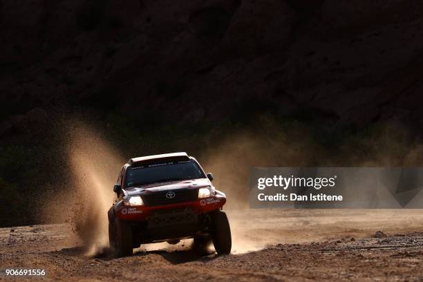 Antanas Juknevicius of Lithuania and Craft Bearings drives with co-driver Darius Vaiciulis of Lithuania in the Hilux Overdrive Toyota car in the...