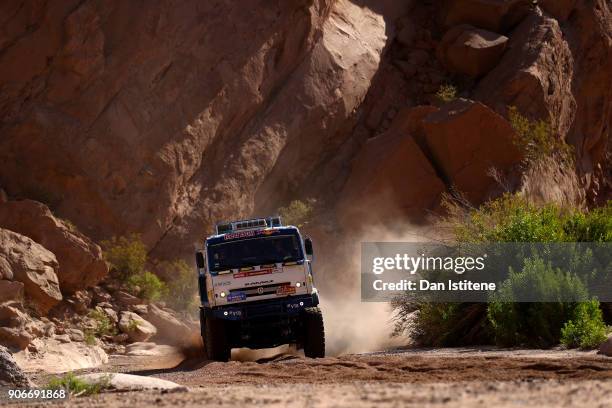 Eduard Nikolaev of Russia and Team KAMAZ Master drives with co-driver Evgeny Yakovlev of Russia and mechanic Vladimir Rybakov of Russia in a 4326...