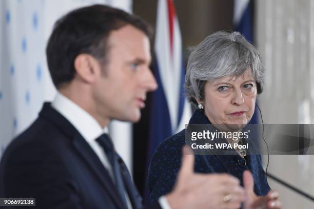 British Prime Minister Theresa May and French President Emmanuel Macron attend a press conference at the Royal Military Academy Sandhurst, after...