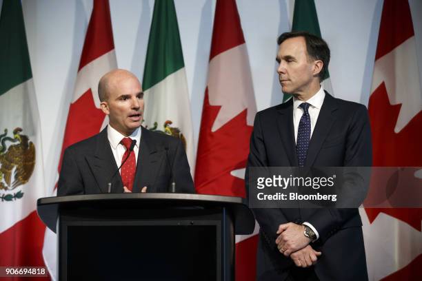Jose Antonio Gonzalez Anaya, Mexico's finance minister, left, speaks while Bill Morneau, Canada's finance minister, listens during a joint news...