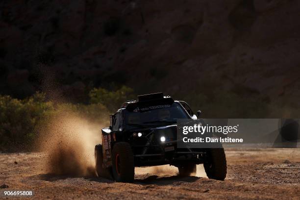 Tim Coronel of the Netherlands and Suzuki Maxxis Super B drives with co-driver Tom Coronel of the Netherlands the Jefferies Dakar Rally car in the...
