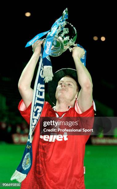 Neil Lennon of Leicester City celebrates with the trophy after the 1997 Coca Cola League Cup Final Replay between Leicester City and Middlesbrough at...