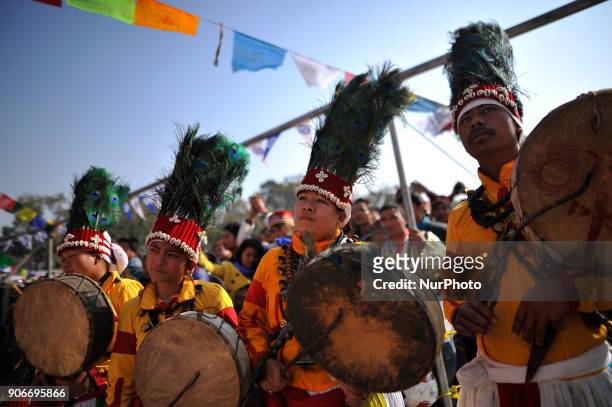 Nepalese people from Tamang community plays traditional instruments during celebration of Sonam Losar festival or Lunar New Year, which occurs around...